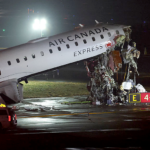 Air Canada jet hits fire truck, killing 2 and forcing New York's LaGuardia airport to close