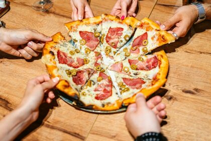 Popular pizza chains face backlash over surging menu prices