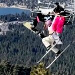 Skier's prank backfires, leaving her dangling 65 feet in the air as twin desperately holds on