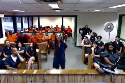 Woman accused of fatal hit-and-run that killed 8 year old laughs during first court appearance