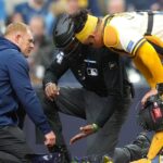 Embattled MLB umpire CB Bucknor leaves game after taking foul ball to mask day after controversial call