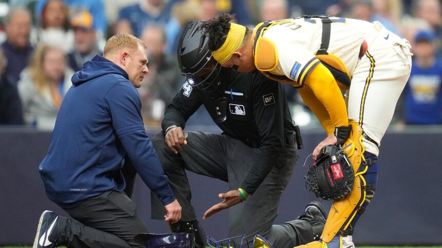 Embattled MLB umpire CB Bucknor leaves game after taking foul ball to mask day after controversial call