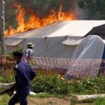 Ebola treatment center set on fire in Congo after residents clash with authorities over victim's body