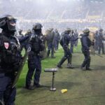 French football match descends into chaos as furious Nantes fans breach security, storm pitch
