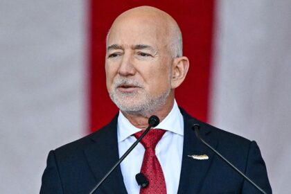 Jeff Bezos confronted on Washington Post layoffs, argues paper must be profitable regardless of his wealth