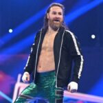 Sami Zayn turns his back on Cody Rhodes during Gunther's post-match attack