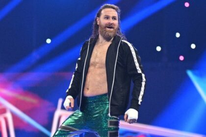 Sami Zayn turns his back on Cody Rhodes during Gunther's post-match attack