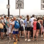Stunning vacation hot spot turns into overcrowded nightmare as tourists flood streets