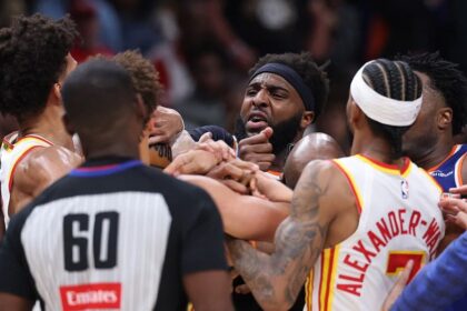 Two players ejected after scrum amid Knicks' 50-point lead vs. Hawks sends referee crashing to the court