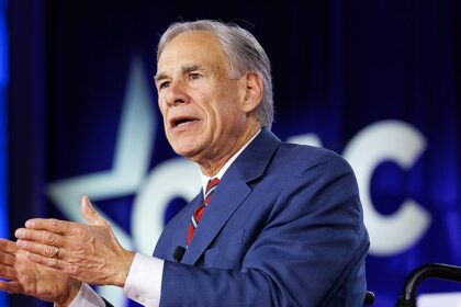 Greg Abbott posts AI image of himself dunking in Spurs jersey to troll Kathy Hochul after Knicks gaffe
