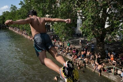 Popular city bans public alcohol amid heat wave as people take risks to cool down
