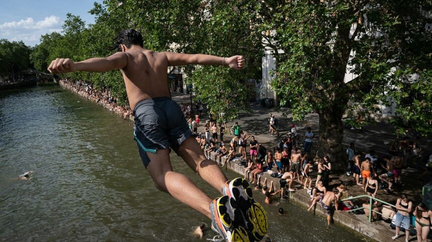 Popular city bans public alcohol amid heat wave as people take risks to cool down