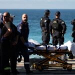 Woman airlifted to hospital with serious injuries after shark attack at popular Sydney beach