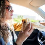 More Americans now eat in their cars than ever before as expert reveals what it says about modern life