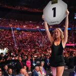 Sophie Cunningham kicks off her shoes and walks the Octagon at UFC 329 as a surprise ring girl