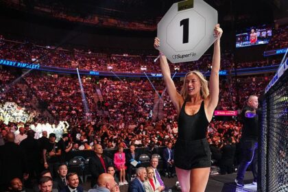Sophie Cunningham kicks off her shoes and walks the Octagon at UFC 329 as a surprise ring girl